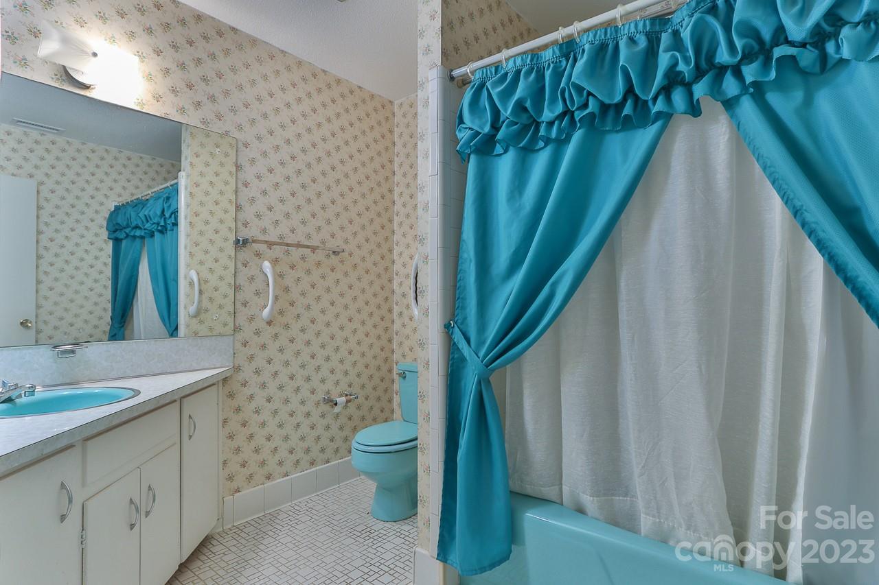 4081 Section House Road Hickory, NC 28601 - Photo 26 of 48 a bathroom with a sink a toilet and a mirror