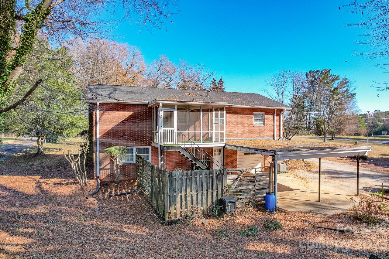 4081 Section House Road Hickory, NC 28601 - Photo 44 of 48 a view of a house with a yard and furniture