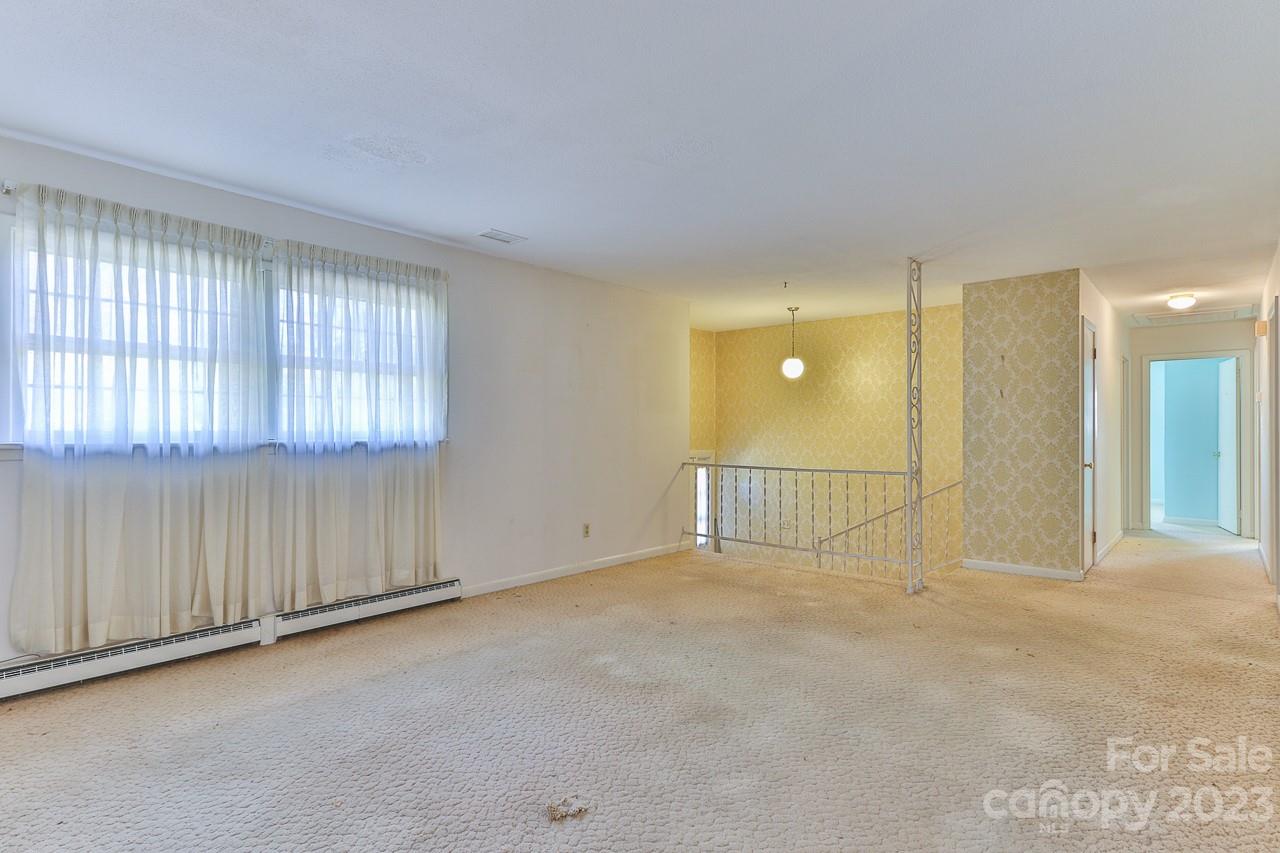 4081 Section House Road Hickory, NC 28601 - Photo 10 of 48 an empty room with a empty space and windows