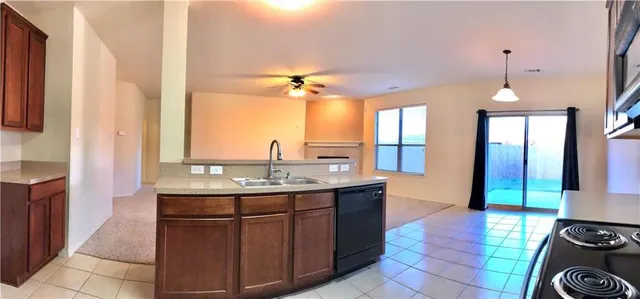 a view of a kitchen with a sink