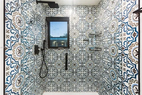 a view of a patio with swimming pool table and chairs