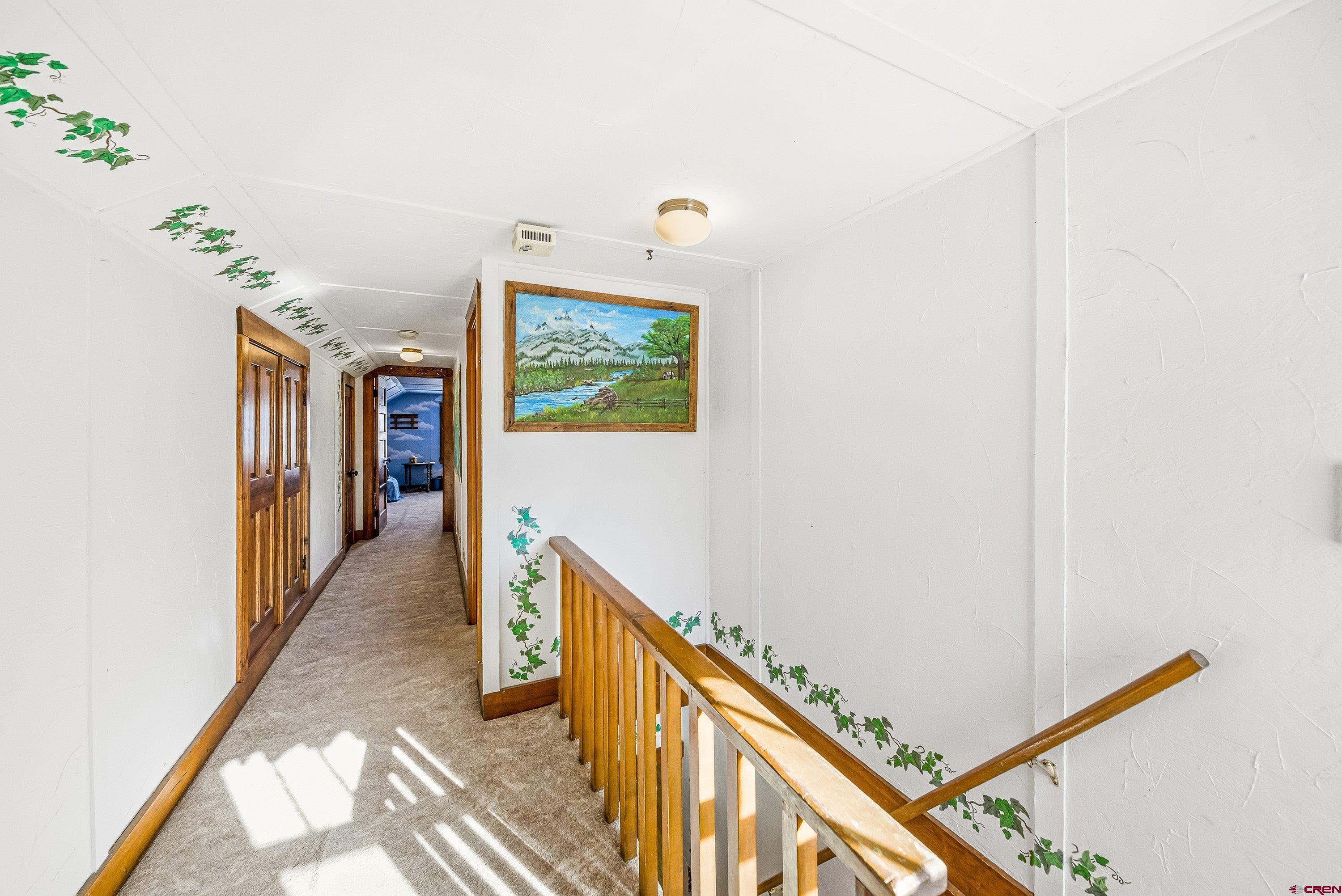 21568 Austin Road Austin, CO 81410 - Photo 21 of 37 a view of hallway with stairs