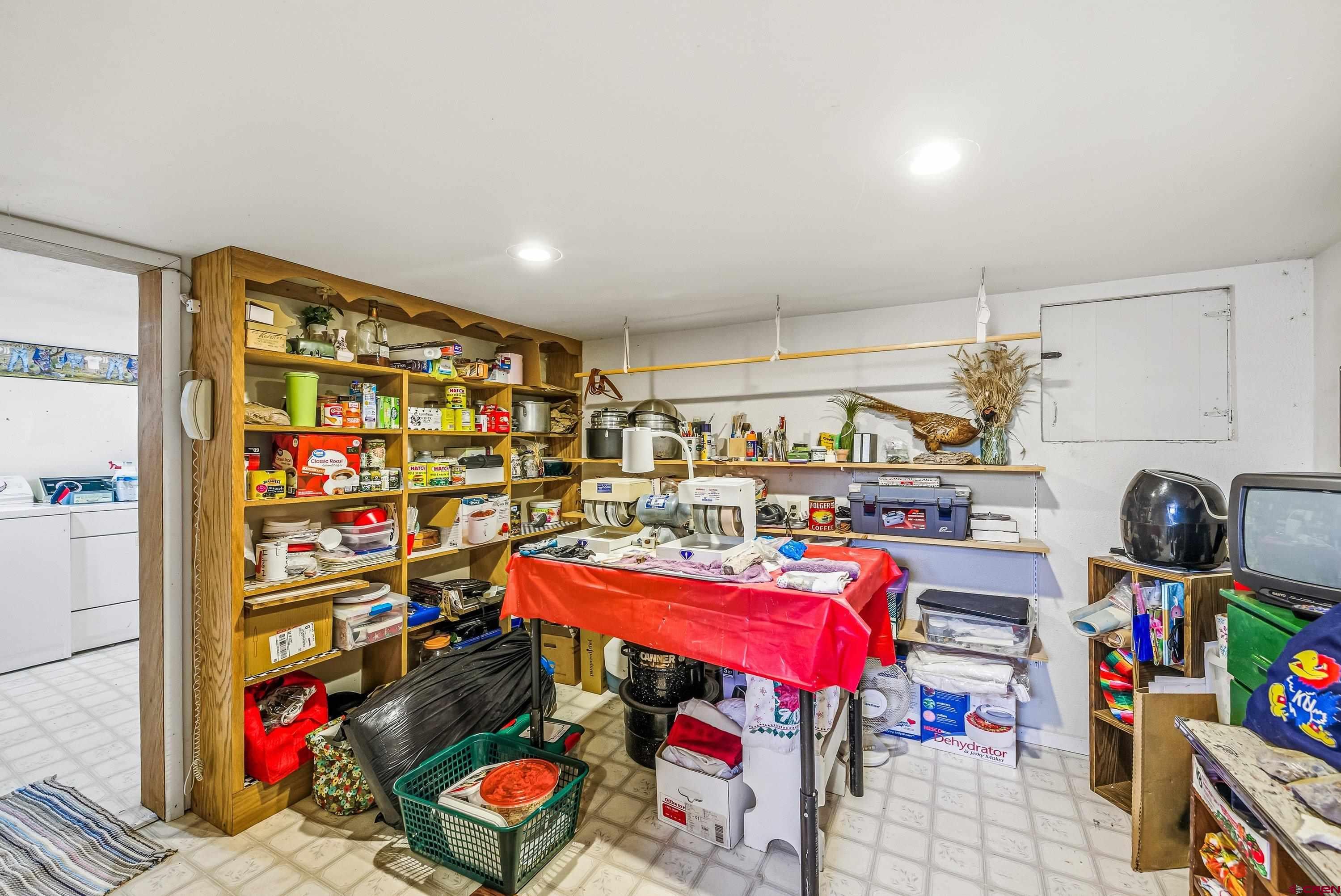 21568 Austin Road Austin, CO 81410 - Photo 28 of 37 a utility room with lot of items