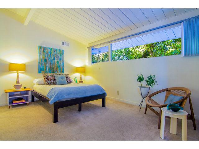 795 Greer Road Palo Alto, CA 94303 - Photo 7 of 9 a bedroom with a bed chair and a potted plant