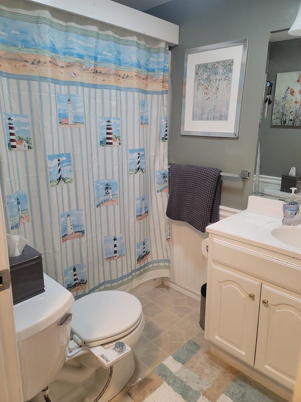 95 Spring Street Hyannis, MA 02601 - Photo 18 of 38 a bathroom with a sink toilet and shower