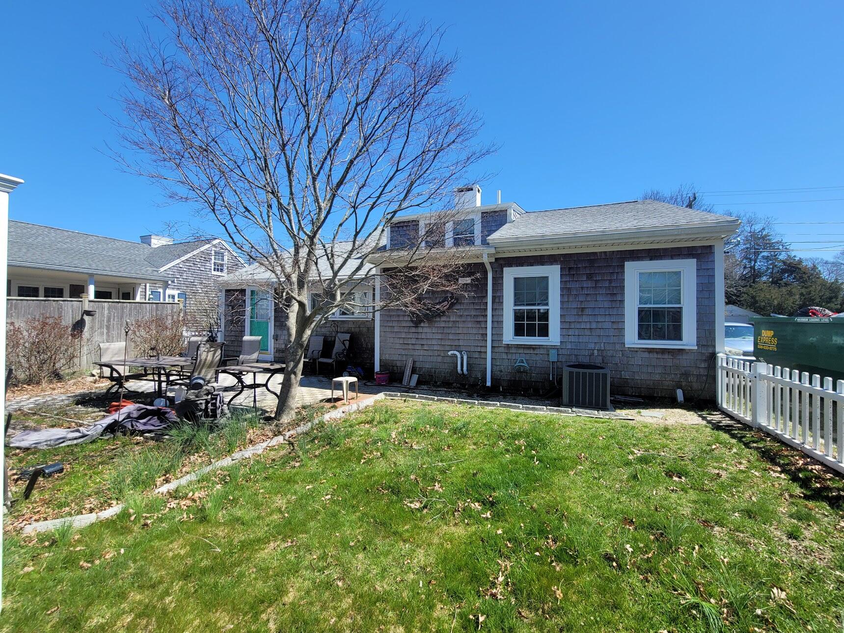 95 Spring Street Hyannis, MA 02601 - Photo 2 of 38 a view of a house with a yard
