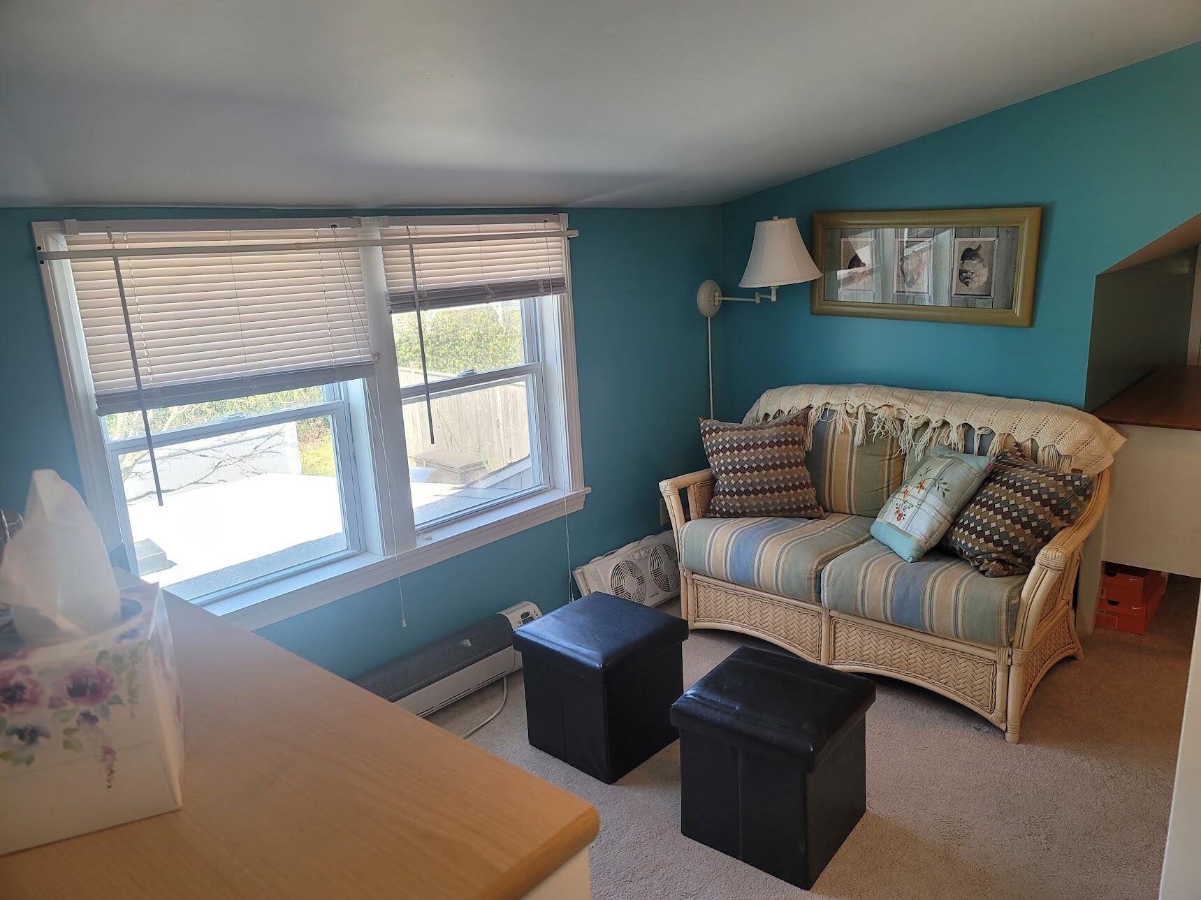 95 Spring Street Hyannis, MA 02601 - Photo 23 of 38 a living room with furniture and a window