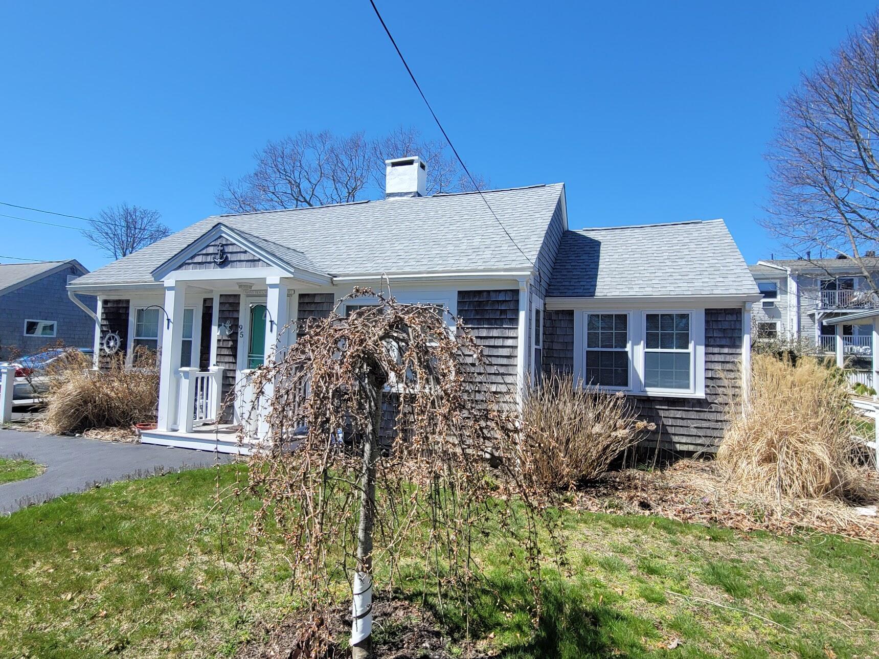 95 Spring Street Hyannis, MA 02601 - Photo 33 of 38 a front view of a house with garden