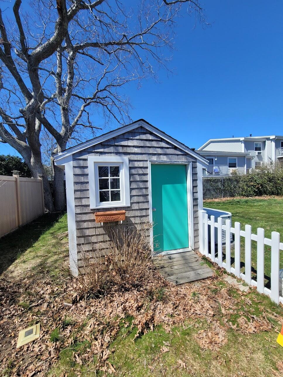 95 Spring Street Hyannis, MA 02601 - Photo 34 of 38 a view of a house with a yard