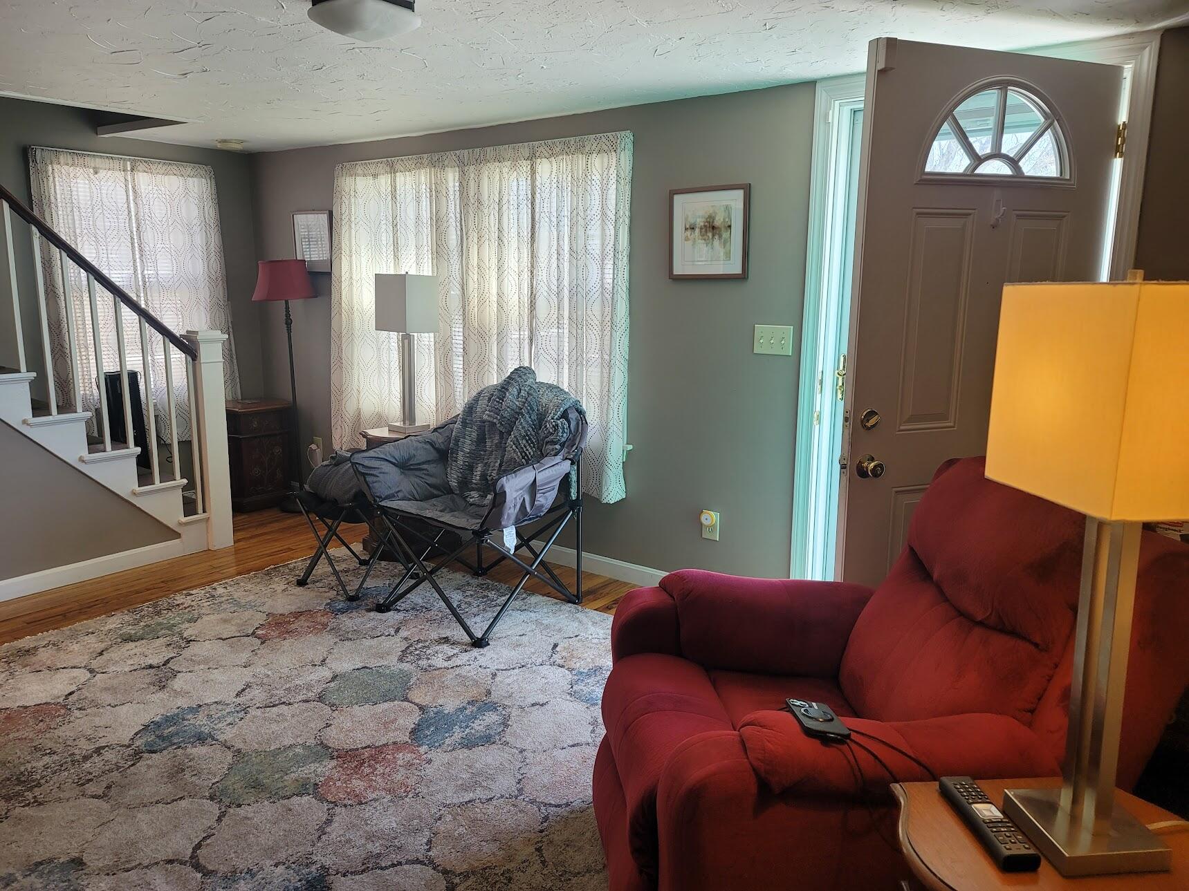 95 Spring Street Hyannis, MA 02601 - Photo 8 of 38 a living room with furniture and a window