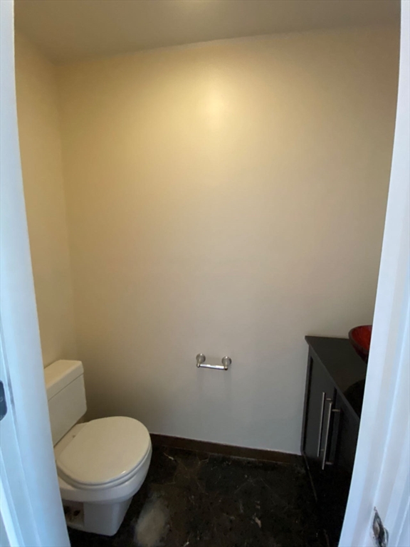 22 Chestnut Street, Unit 22 Cambridge, MA 02139 - Photo 17 of 18 a bathroom with a sink and toilet