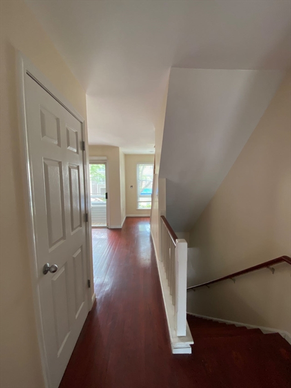 22 Chestnut Street, Unit 22 Cambridge, MA 02139 - Photo 6 of 18 a view of hallway with wooden floor