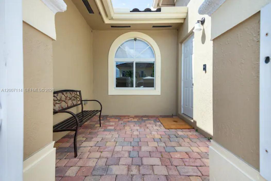 15566 Southwest 13th Terrace Miami, FL 33194 - Photo 3 of 27 a view of entryway with furniture