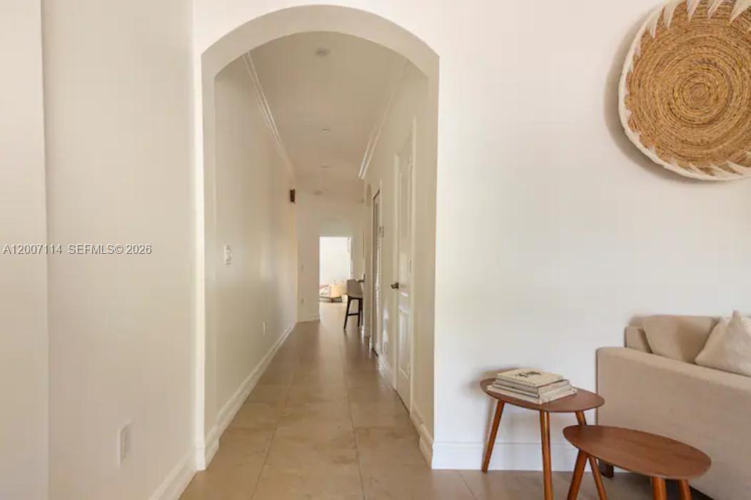15566 Southwest 13th Terrace Miami, FL 33194 - Photo 4 of 27 a view of a hallway with furniture