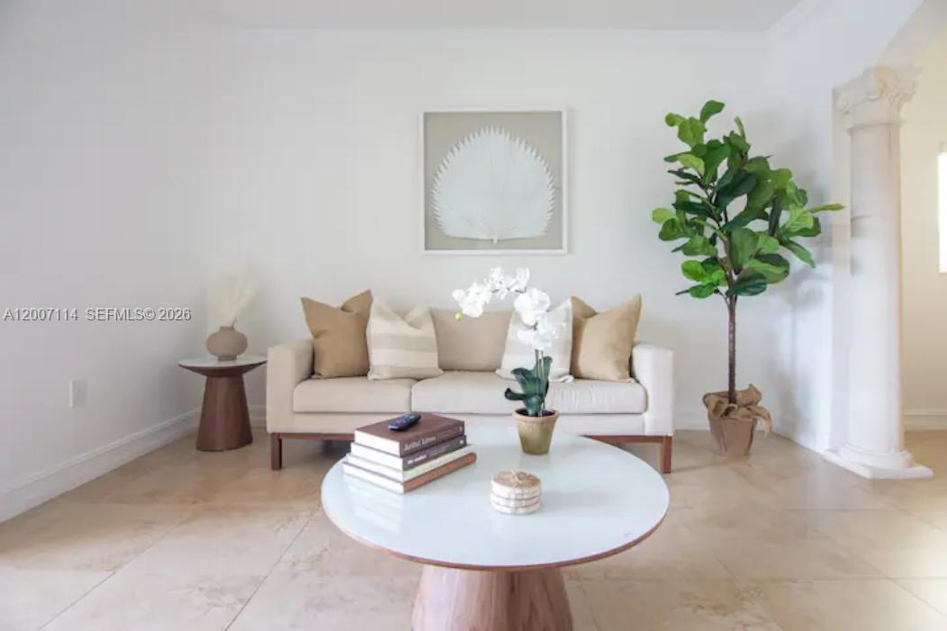 15566 Southwest 13th Terrace Miami, FL 33194 - Photo 6 of 27 a dining room with furniture and wooden floor