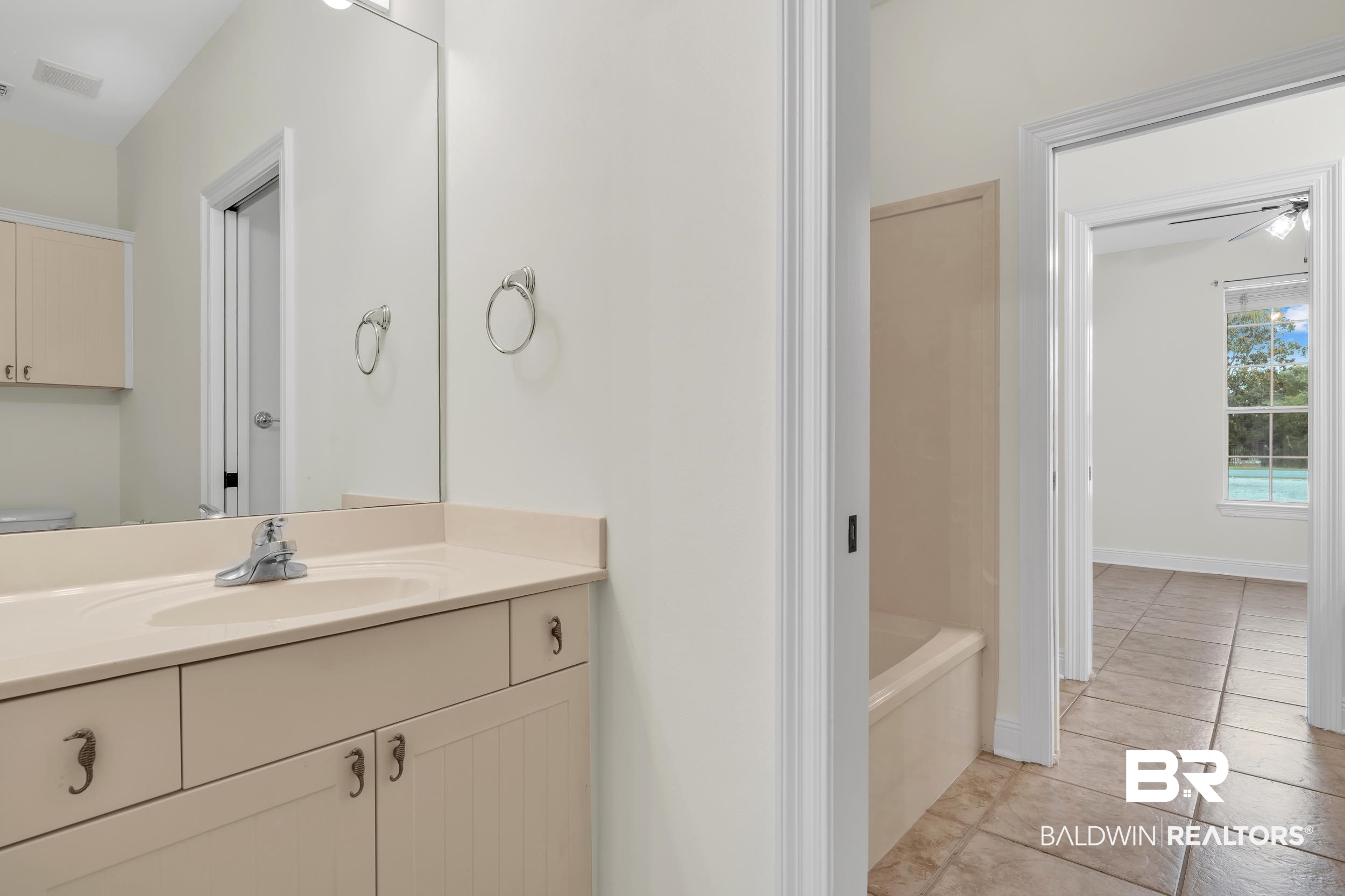 4606 Osprey Drive Orange Beach, AL 36561 - Photo 38 of 44 Jack and Jill bathroom featuring 2 private water closets.