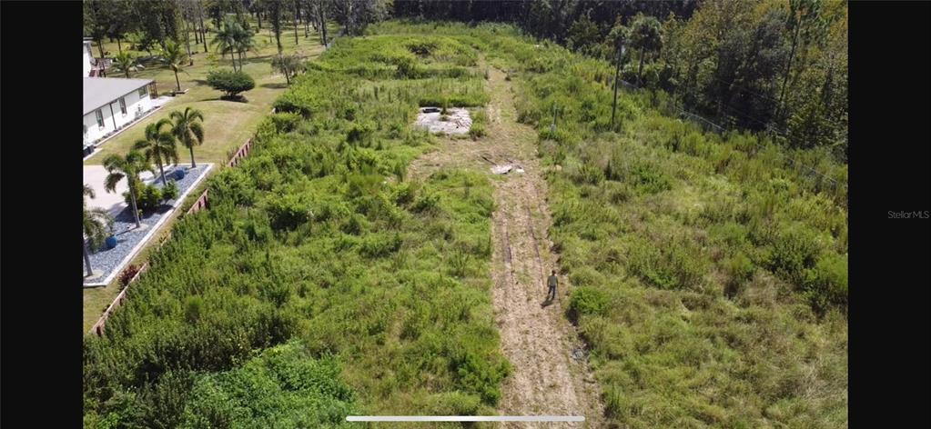 805 Baron Road Orlando, FL 32828 - Photo 9 of 11 a aerial view of a house with a yard