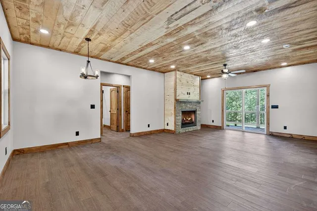 a kitchen with stainless steel appliances a refrigerator sink and microwave