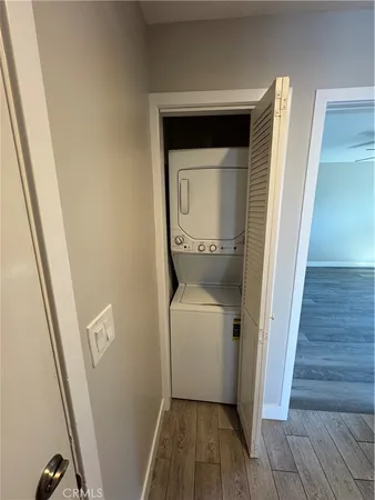 a utility room with washing machine