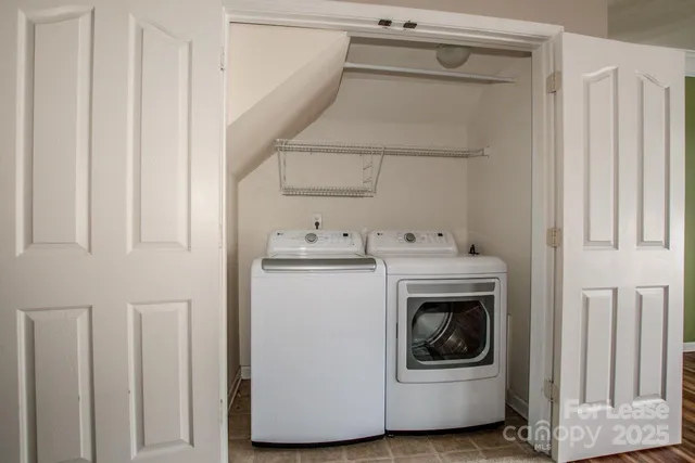 a utility room with dryer and washer