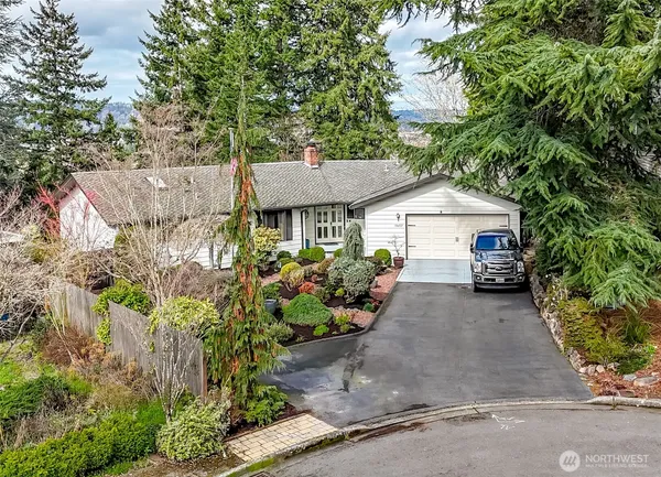a car parked in front of a house