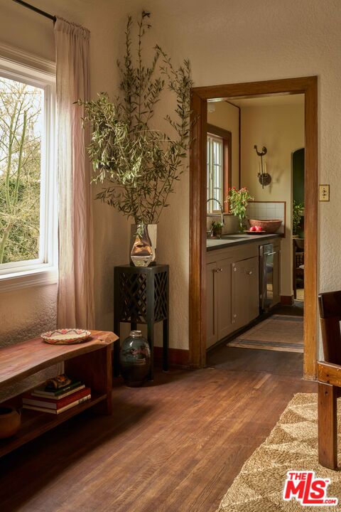 4179 South Van Ness Avenue Los Angeles, CA 90008 - Photo 14 of 44 a kitchen with kitchen island a counter and a sink