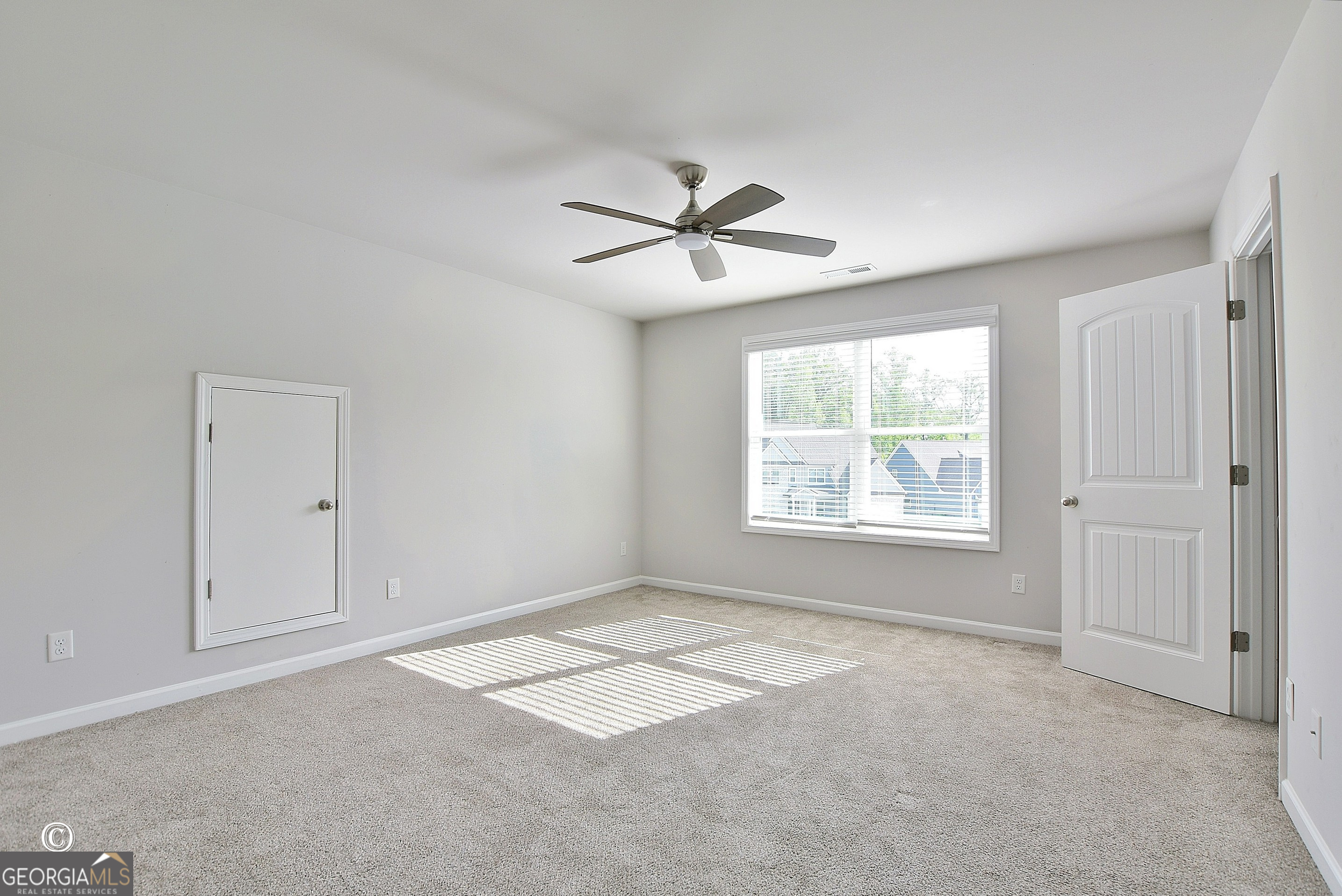 5066 Pond View Court Columbus, GA 31907 - Photo 19 of 30 a view of an empty room with a window