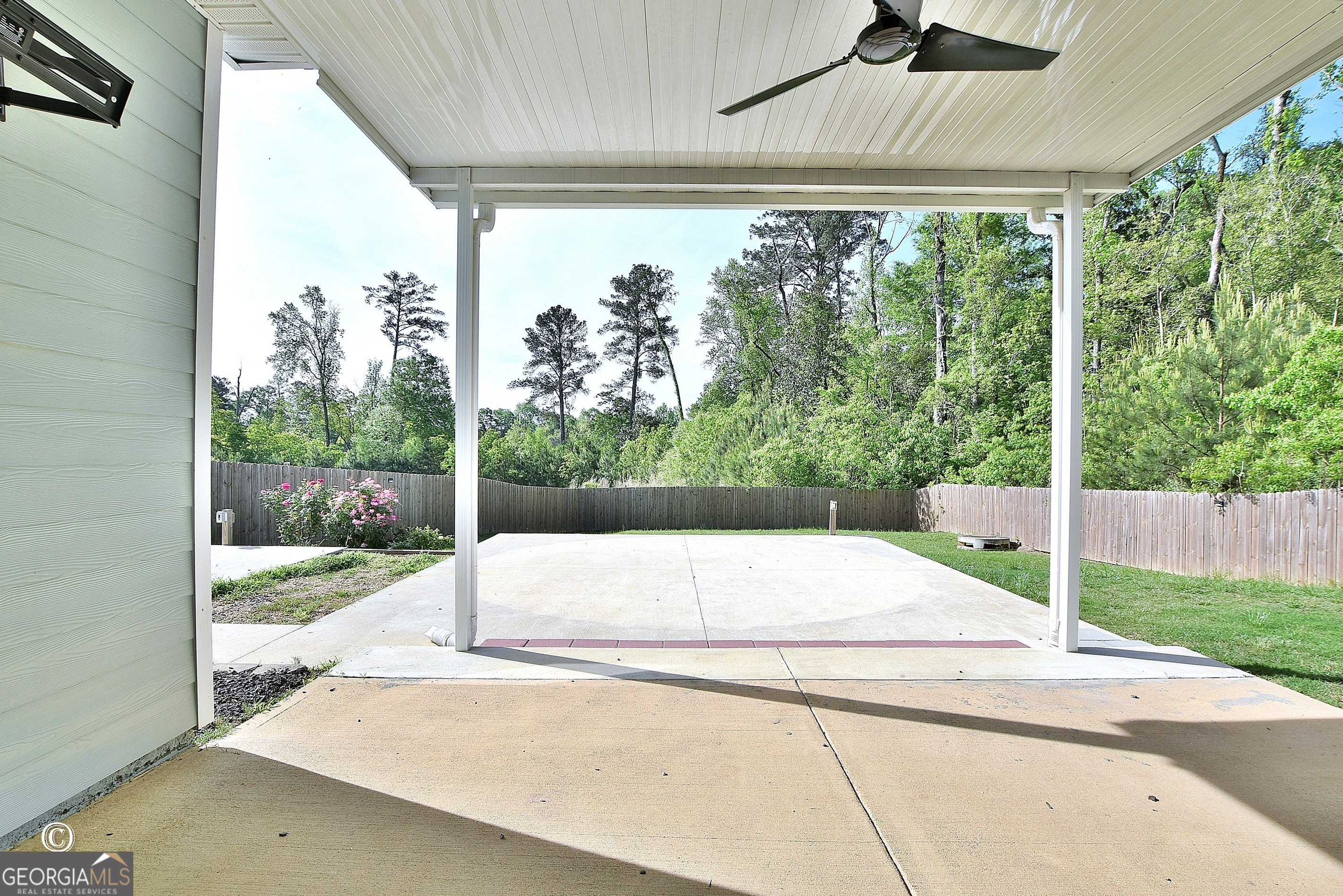 5066 Pond View Court Columbus, GA 31907 - Photo 24 of 30 a white bench sitting in front of a building