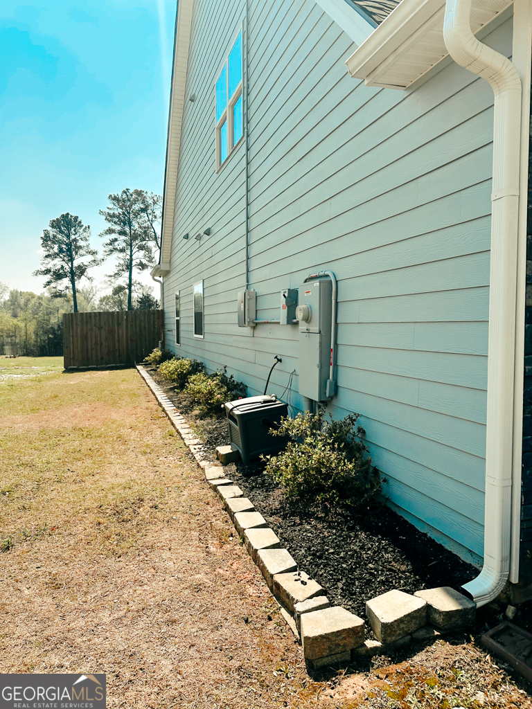 5066 Pond View Court Columbus, GA 31907 - Photo 29 of 30 a view of a backyard with sitting area
