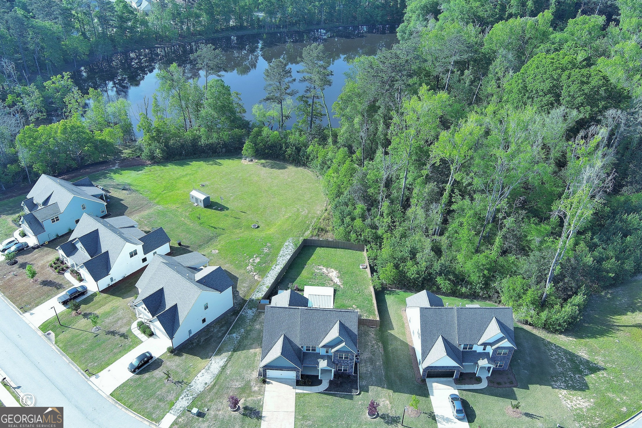5066 Pond View Court Columbus, GA 31907 - Photo 3 of 30 an aerial view of a house with garden space and street view