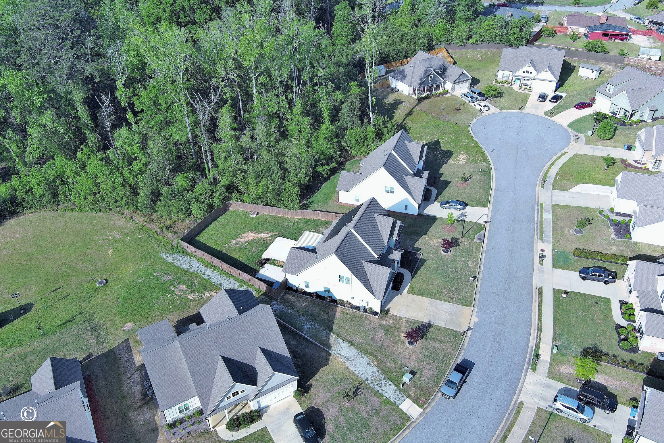 5066 Pond View Court Columbus, GA 31907 - Photo 6 of 30 an aerial view of a house with a swimming pool patio and outdoor seating