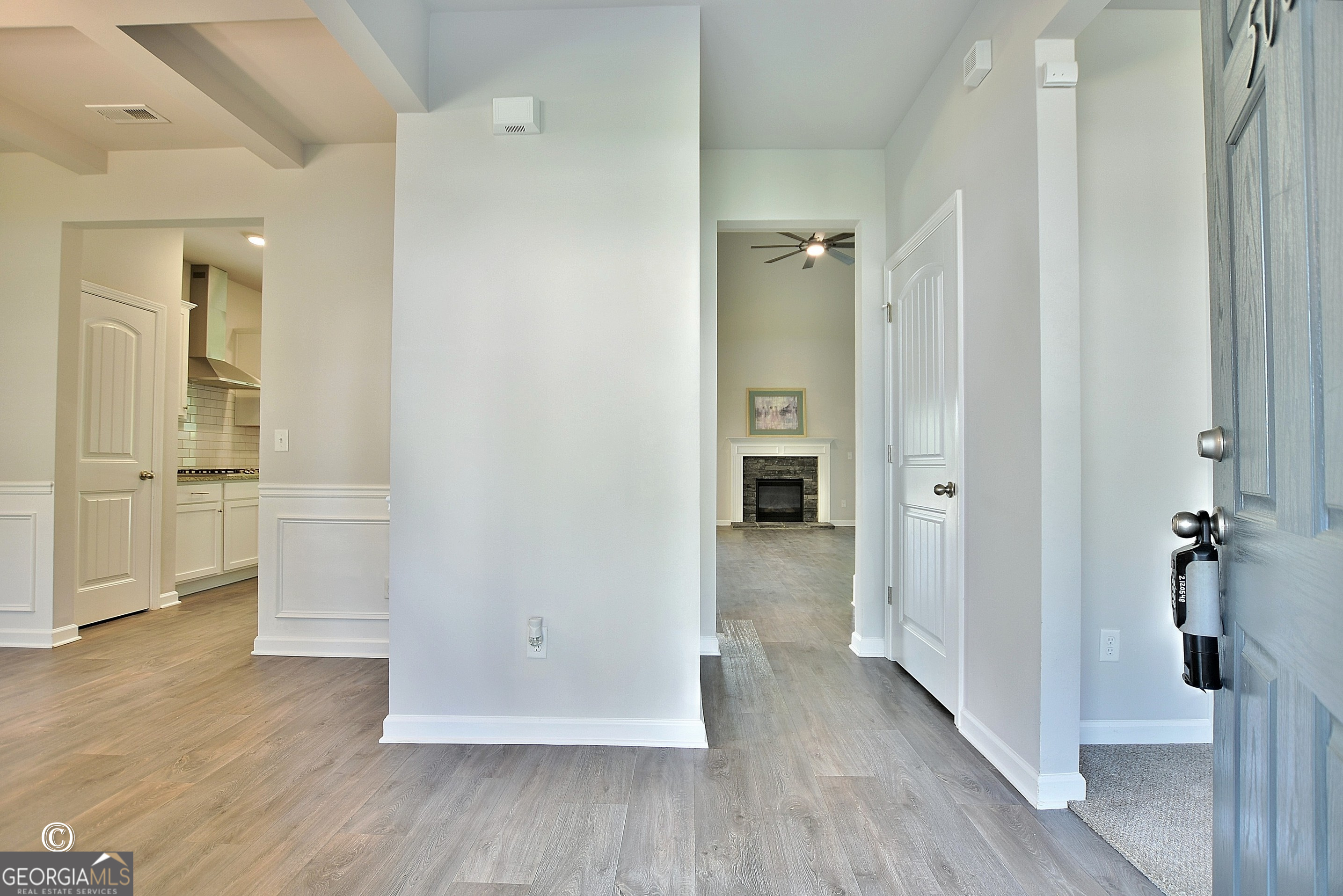 5066 Pond View Court Columbus, GA 31907 - Photo 9 of 30 wooden floor with white walls