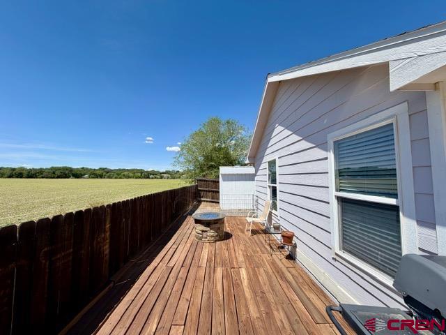 544 20th Street Delta, CO 81416 - Photo 35 of 44 a view of balcony with wooden floor and outdoor space