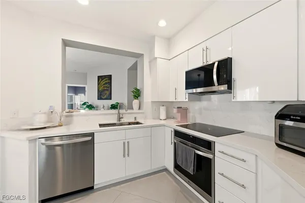 $449,000 | 3570 Haldeman Creek Drive, Unit 111, Naples, FL 34112