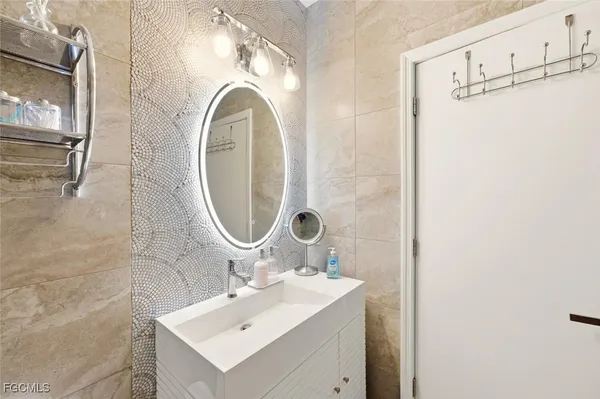 $449,000 | 3570 Haldeman Creek Drive, Unit 111, Naples, FL 34112