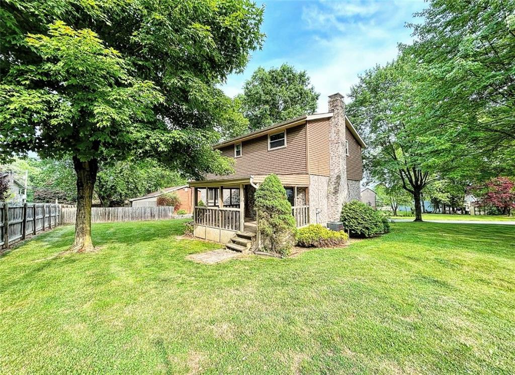 102 Crosslands Road Butler, PA 16002 - Photo 40 of 42 a view of a house with a yard and sitting area