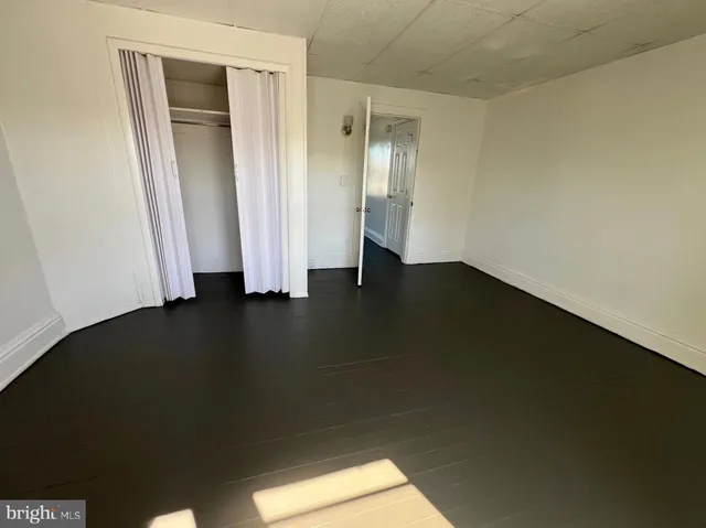 an empty room with a door