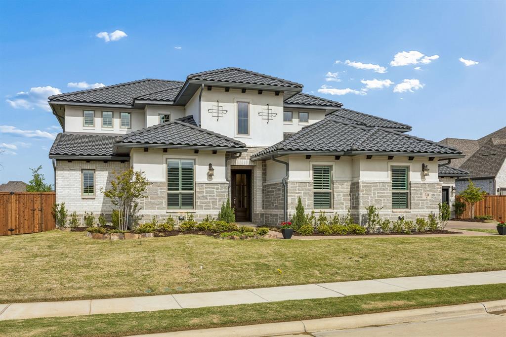311 Pecan Trail Prosper, TX 75078 - Photo 2 of 39 a front view of a house