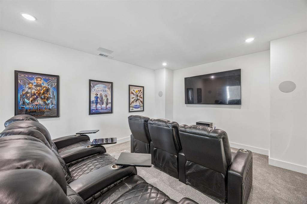 311 Pecan Trail Prosper, TX 75078 - Photo 21 of 39 a living room with furniture and a flat screen tv