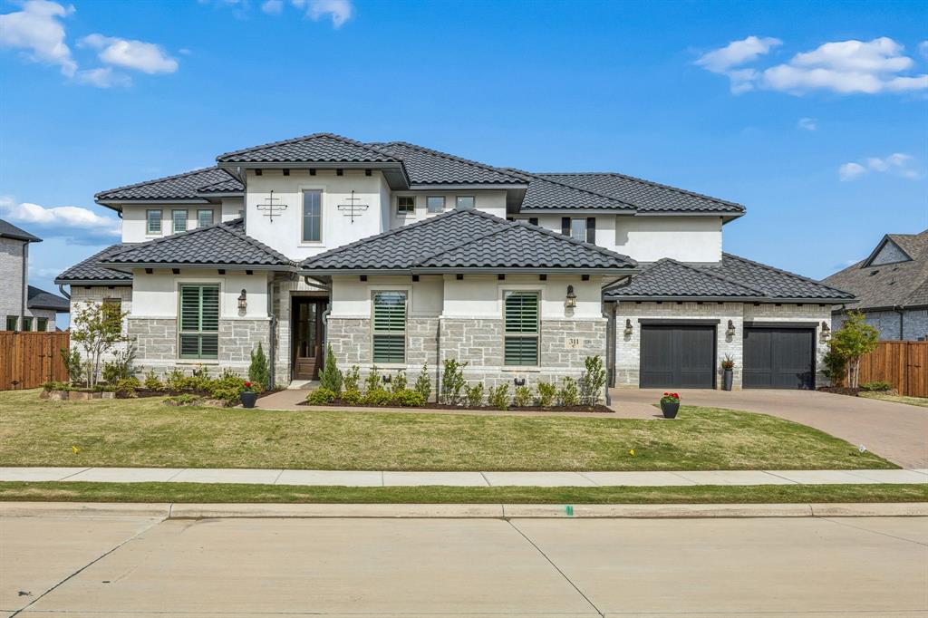 311 Pecan Trail Prosper, TX 75078 - Photo 38 of 39 a front view of a house with a yard