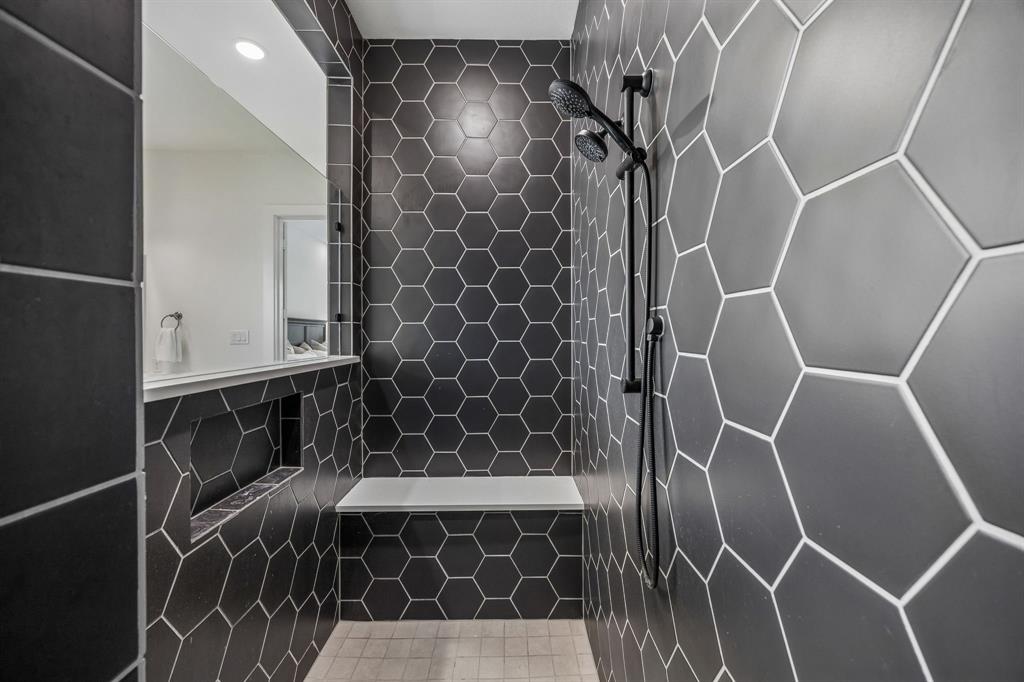 311 Pecan Trail Prosper, TX 75078 - Photo 10 of 39 a bathroom with a shower