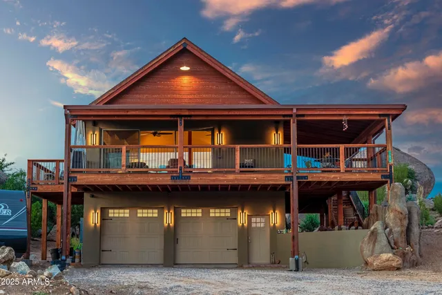 a balcony with furniture and wooden floor