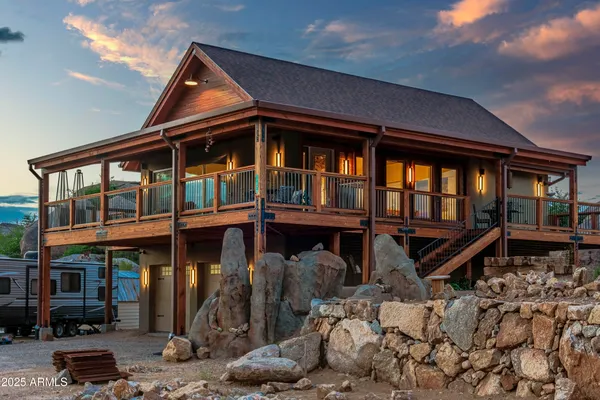 a view of a balcony with wooden floor