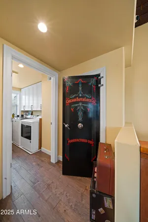 a bedroom with a bed and a desk
