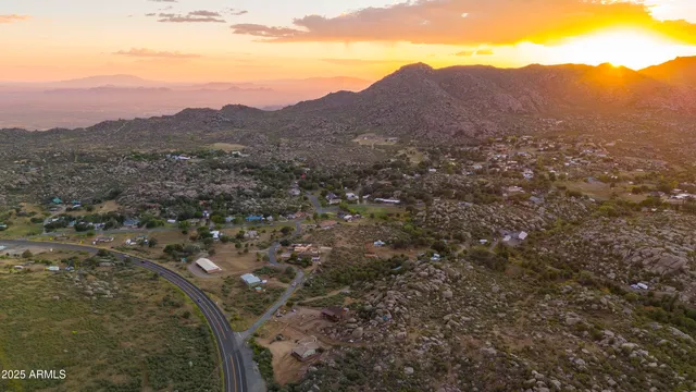 a view of a city with mountains in the background