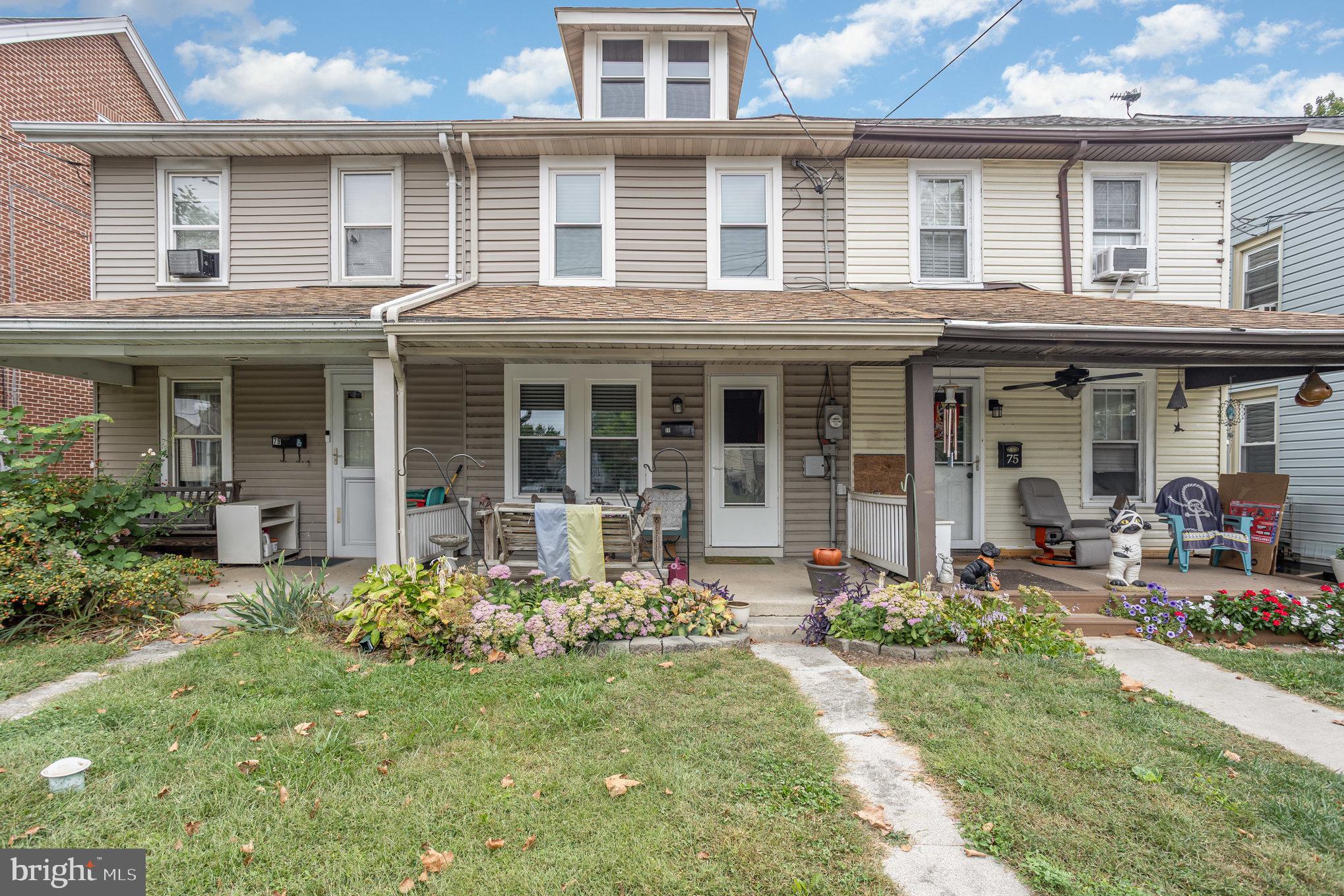 77 Petersburg Road Lancaster, PA 17601 - Photo 1 of 28 a front view of a house with garden and porch