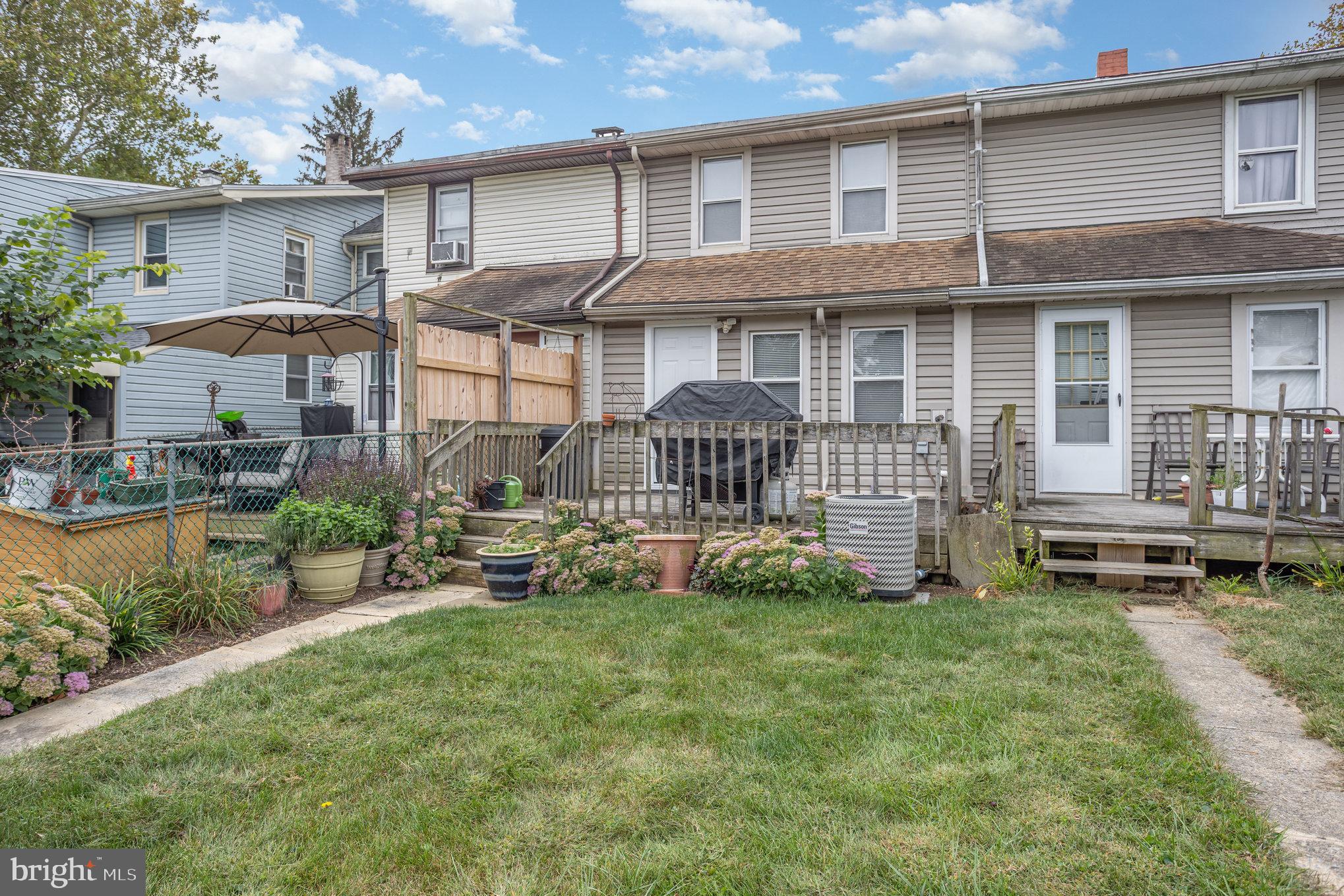 77 Petersburg Road Lancaster, PA 17601 - Photo 21 of 28 a backyard of a house with yard and outdoor seating