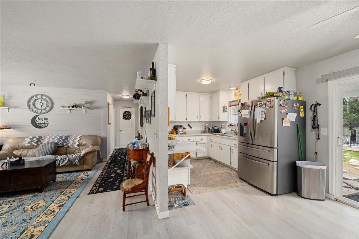 3695 Missouri Flat Road Placerville, CA 95667 - Photo 31 of 64 Easy care vinyl plank flooring in apartment main living areas.