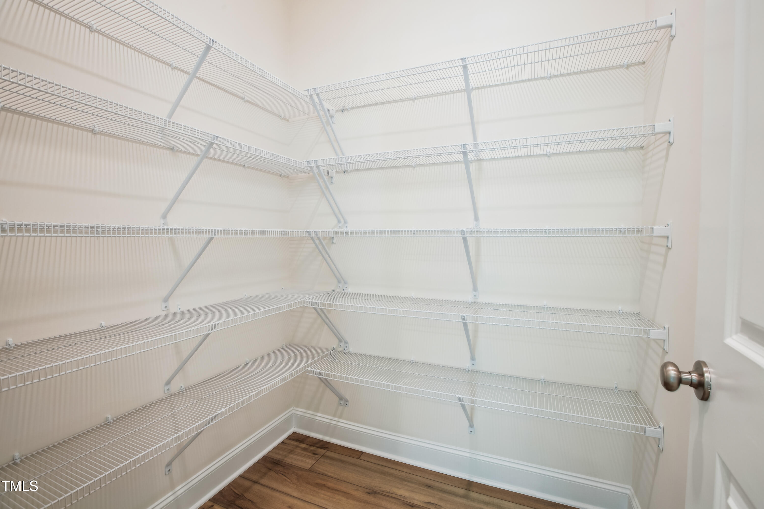 73 Artic Circle Garner, NC 27529 - Photo 12 of 39 a view of a room with empty racks