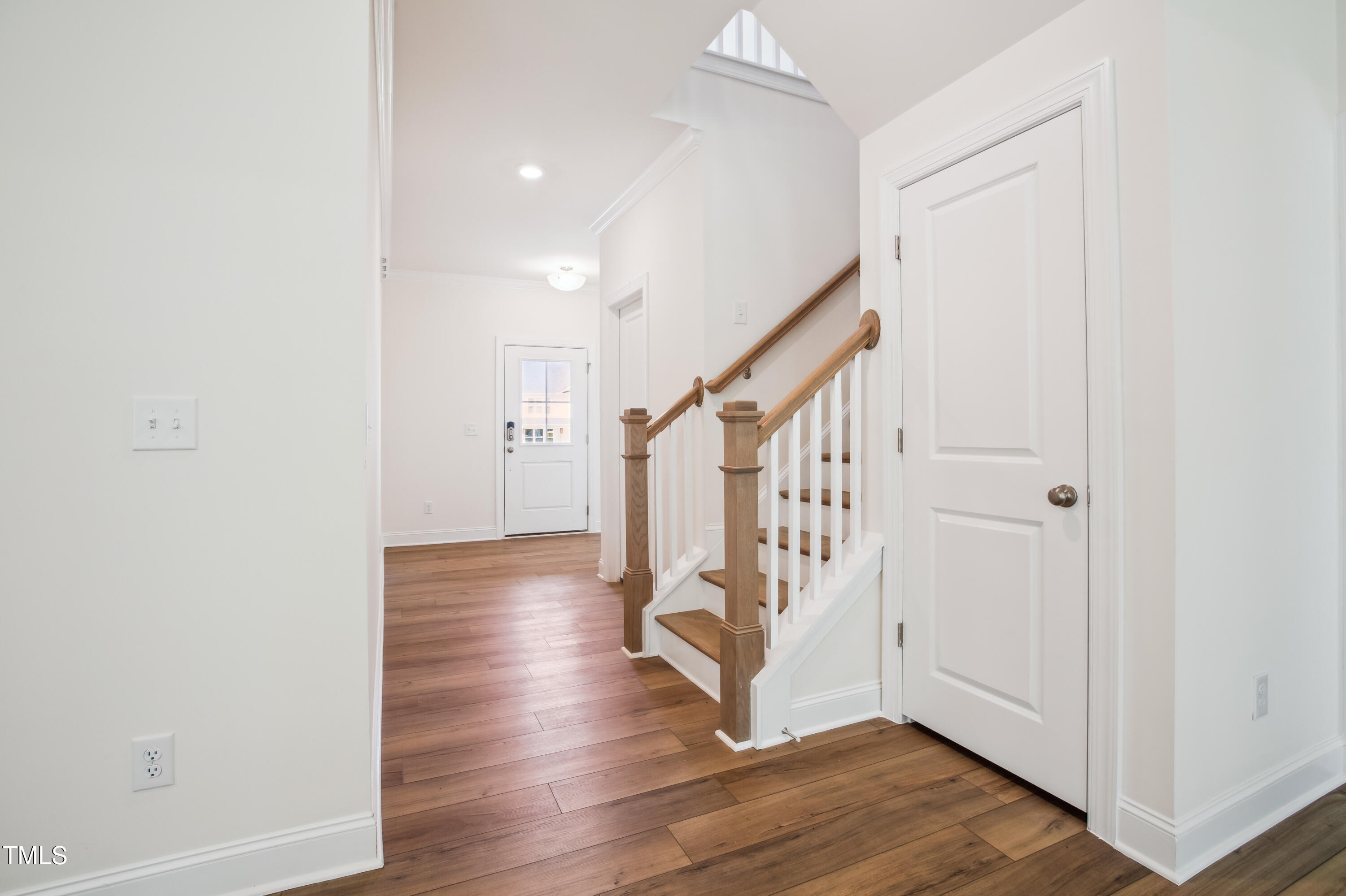 73 Artic Circle Garner, NC 27529 - Photo 14 of 39 a view of entryway with wooden floor